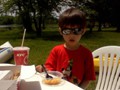 Andrew is so cool eating his KFC on the patio.