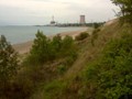 Looking east on Lake Michigan's shore toward the Michigan City cooling tower.