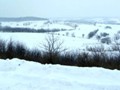 The brutal winter left these fields in the driftless hills of Jo Daviess County covered in snow.