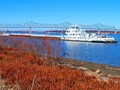 A barge parked at the mouth of the Ohio River.