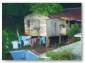 A house in Coxen Hole, hanging out the wash.
