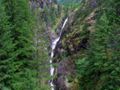 A thin, tall waterfall in the middle of North Cascades NP.