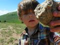 Andrew shows off his bear-smaching rock in the Bighorns.